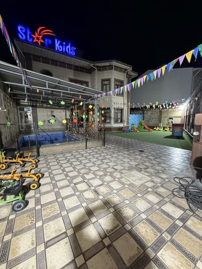 Улица Узумзор ор-р Ялангач Участок 6 сотки действующий детский садик,